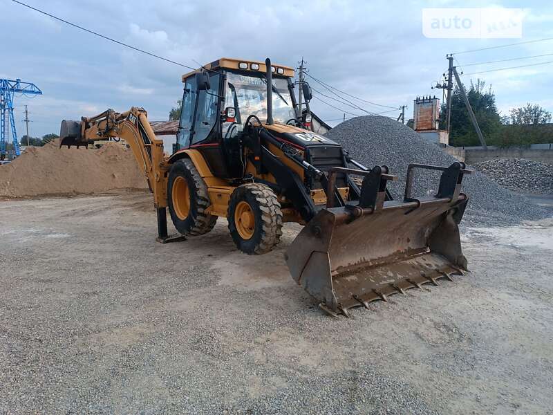 Екскаватор навантажувач Caterpillar 432 2004 в Снятині
