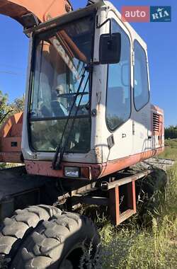 Экскаватор погрузчик Atlas 1304 2000 в 