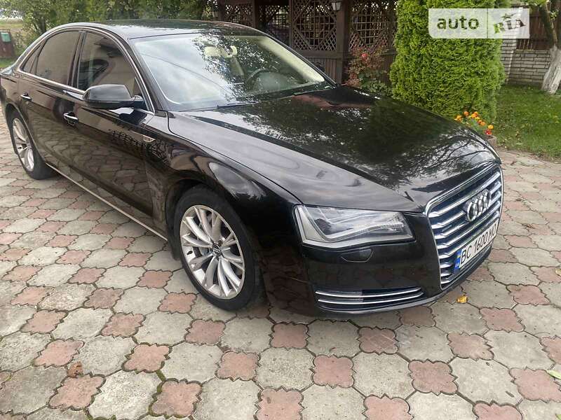 2012 Audi A8, VIN WAUZZZ4H7DN012413:plate — фото 1 (autoria)