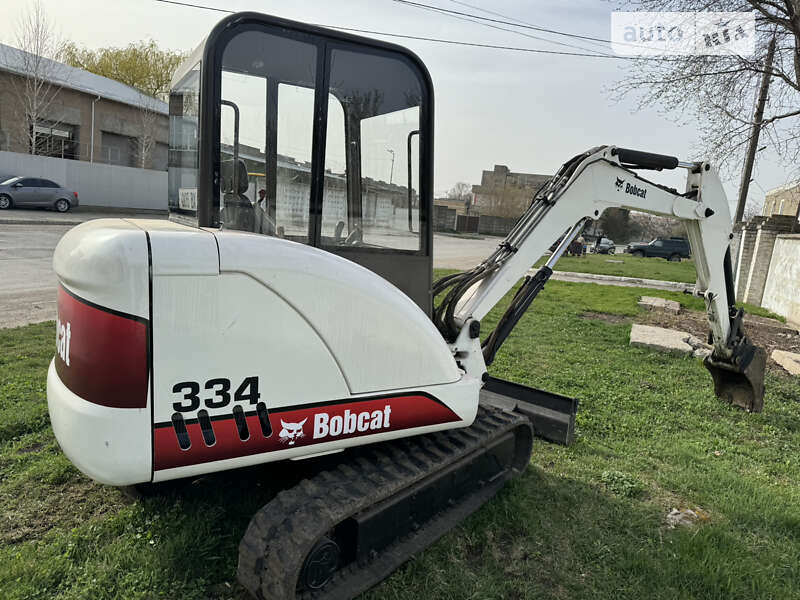 Экскаватор погрузчик Bobcat 334 2003 в Каменец-Подольском