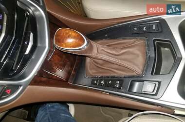 Внедорожник / Кроссовер Cadillac SRX 2014 в 