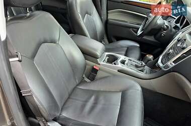 Внедорожник / Кроссовер Cadillac SRX 2010 в 