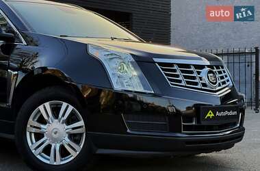 Внедорожник / Кроссовер Cadillac SRX 2014 в 