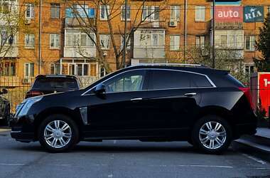 Внедорожник / Кроссовер Cadillac SRX 2014 в 