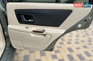 Позашляховик / Кросовер Cadillac SRX 2004 в 