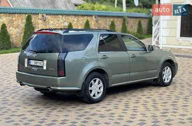 Внедорожник / Кроссовер Cadillac SRX 2004 в 