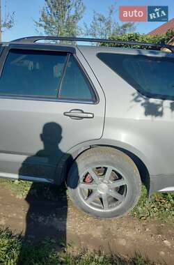 Позашляховик / Кросовер Cadillac SRX 2004 в 