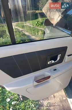 Позашляховик / Кросовер Cadillac SRX 2004 в 