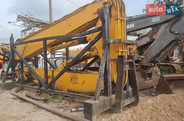 Гусеничный экскаватор Case Construction 450DX 2009 в 