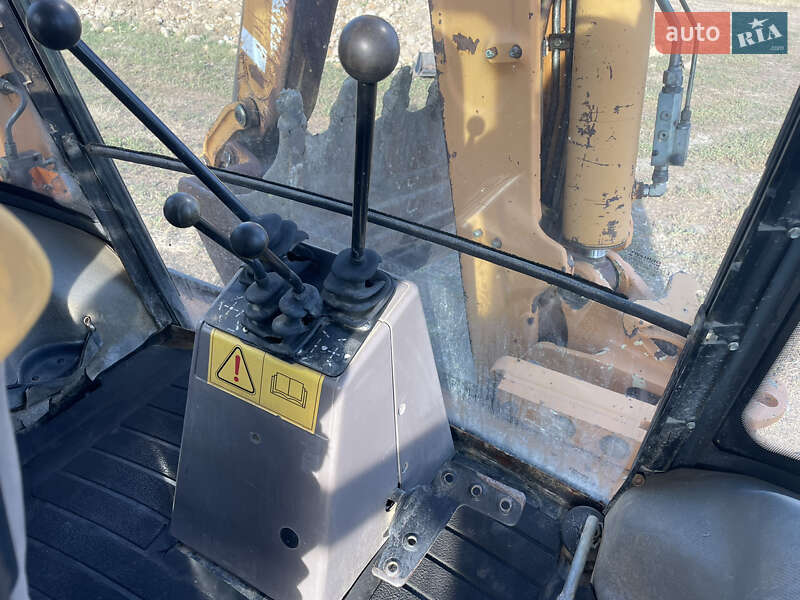 Экскаватор погрузчик Case Construction 590 SL 2003 в Калуше