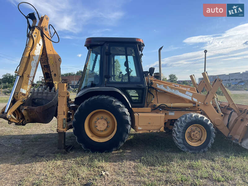 Экскаватор погрузчик Case Construction 590 SL 2003 в Калуше