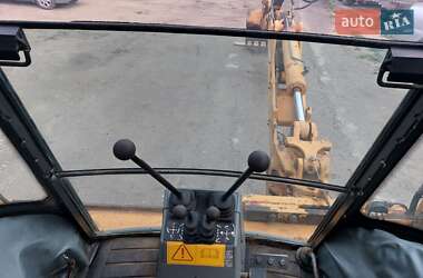 Экскаватор погрузчик Case Construction 590 SL 2001 в 