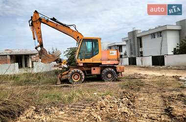 Экскаватор погрузчик Case Construction 695 ST 1994 в 