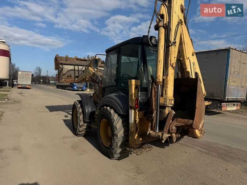 Экскаватор погрузчик Case Construction 695 ST 2002 в Радомышле