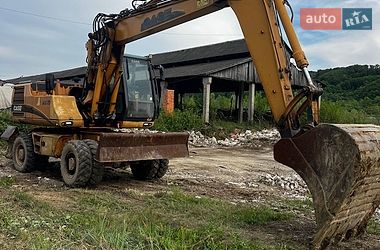 Колесный экскаватор Case Construction WX 165 2003 в Хусте