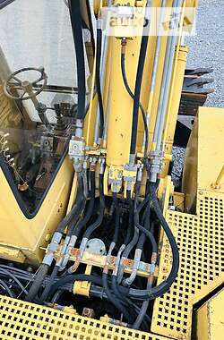 Колісний екскаватор Caterpillar 212 1995 в Жовкві
