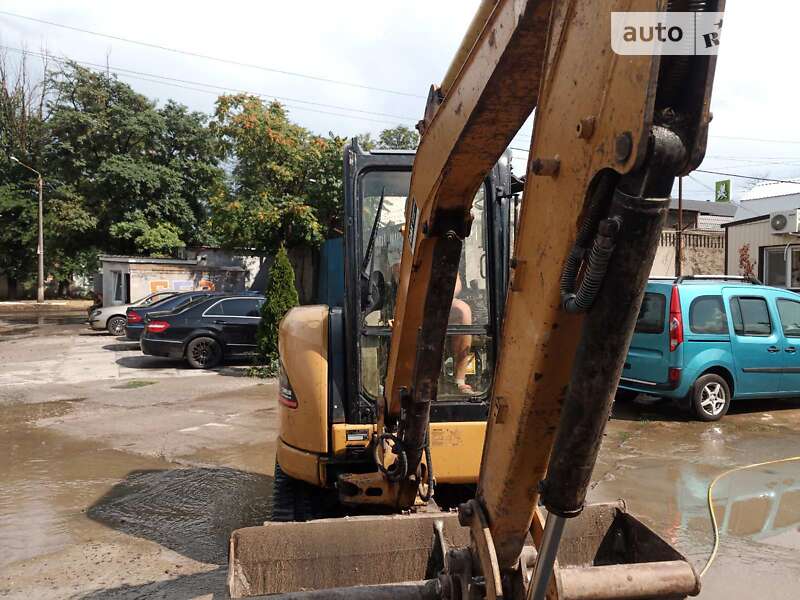 Экскаватор погрузчик Caterpillar 303 2007 в Одессе