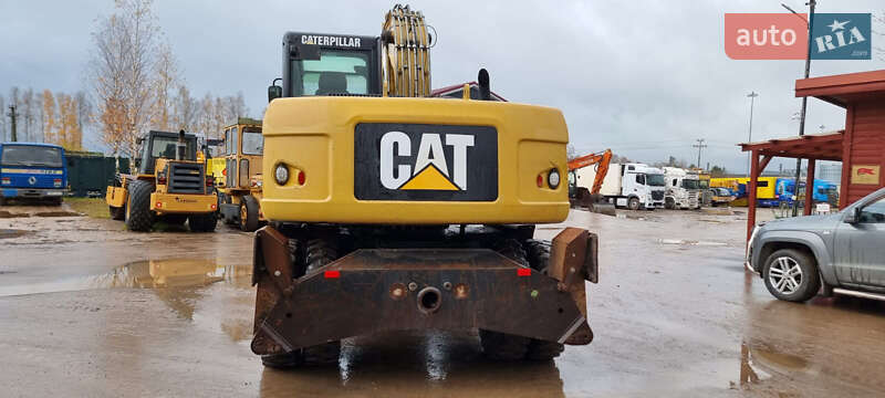 Колесный экскаватор Caterpillar 313 2010 в Одессе