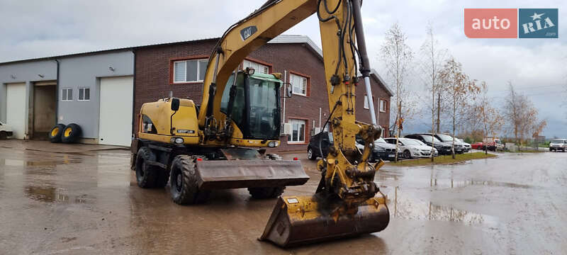 Колесный экскаватор Caterpillar 313 2010 в Одессе