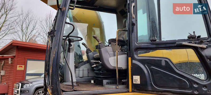 Колесный экскаватор Caterpillar 313 2010 в Одессе