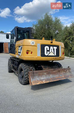 Колесный экскаватор Caterpillar 313 2014 в 
