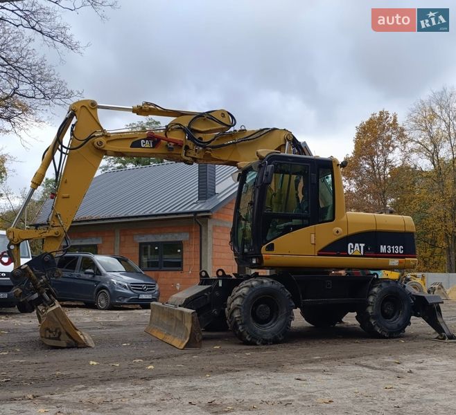 Колесный экскаватор Caterpillar 313 2007 в Львове