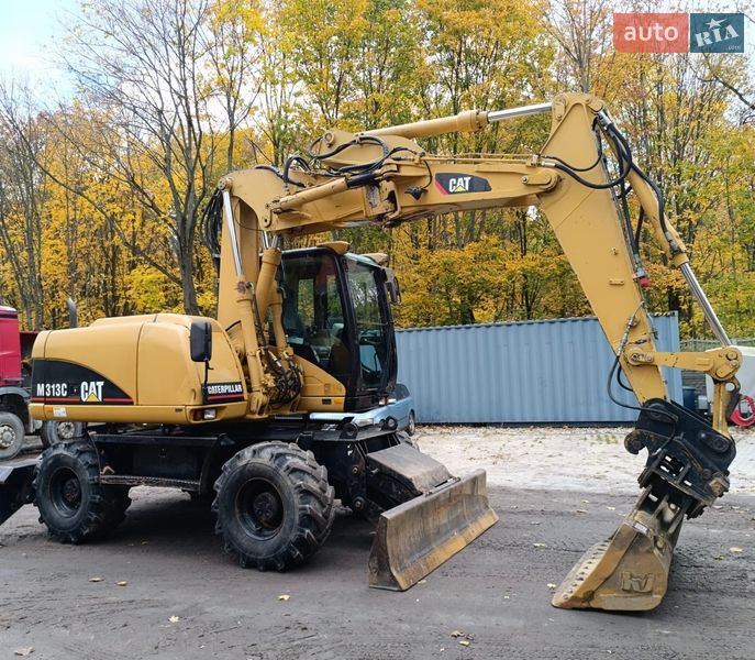 Колесный экскаватор Caterpillar 313 2007 в Львове