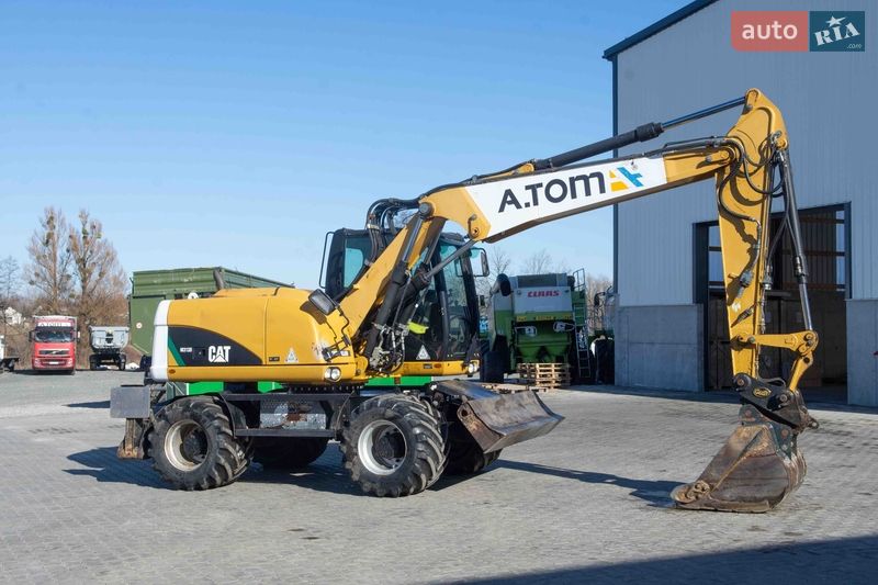 Колісний екскаватор Caterpillar 313 2012 в Житомирі