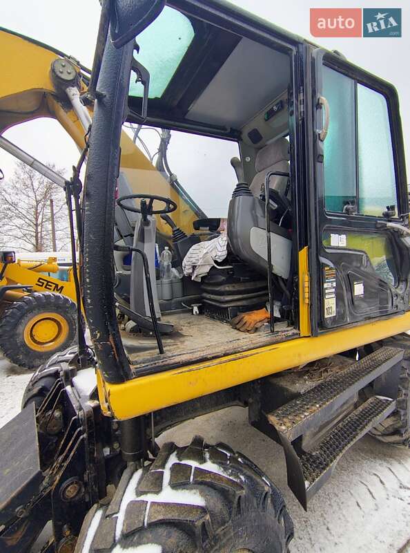 Колесный экскаватор Caterpillar 316 2009 в Николаеве