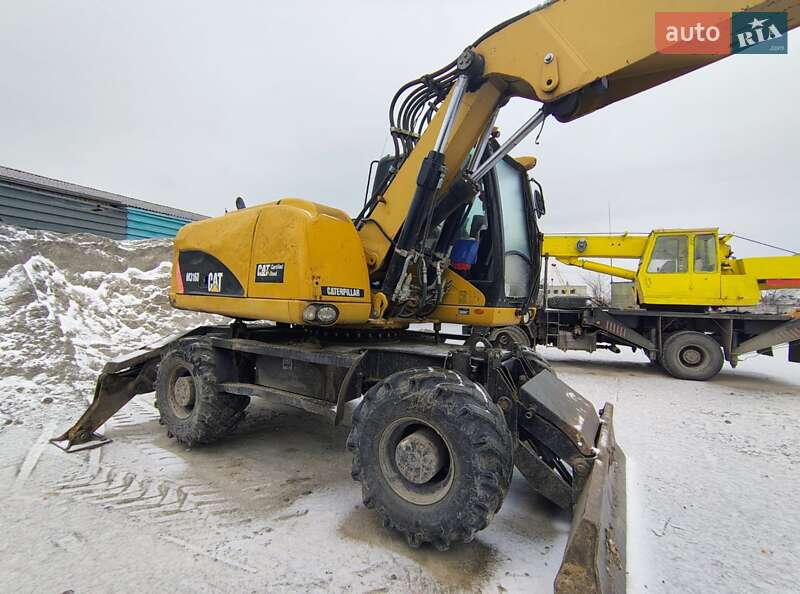 Колесный экскаватор Caterpillar 316 2009 в Николаеве