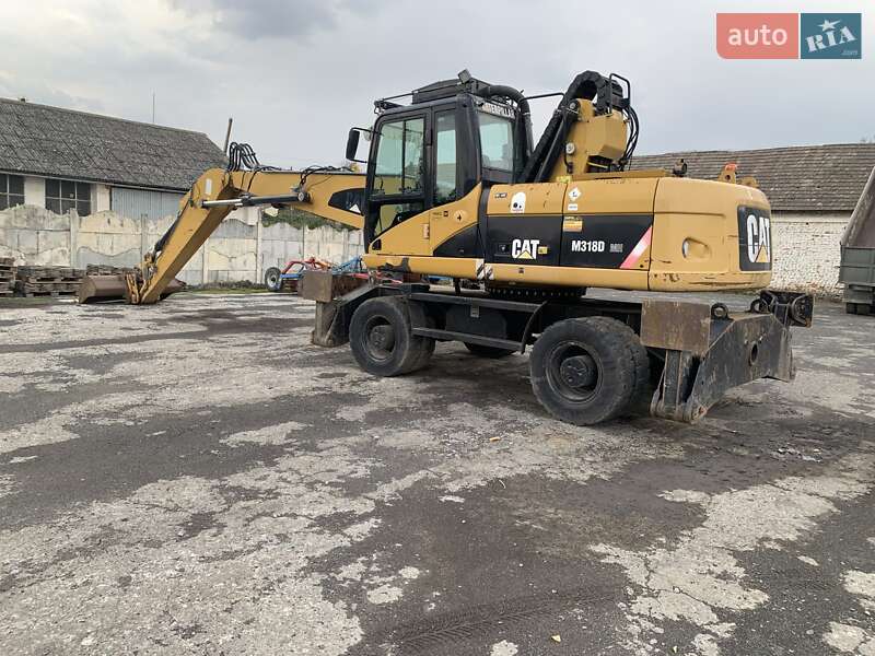 Екскаватор навантажувач Caterpillar 318 2008 в Івано-Франківську