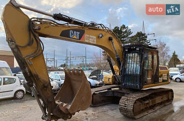 Гусеничный экскаватор Caterpillar 319 2011 в Львове