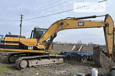 Экскаватор погрузчик Caterpillar 320 1998 в 