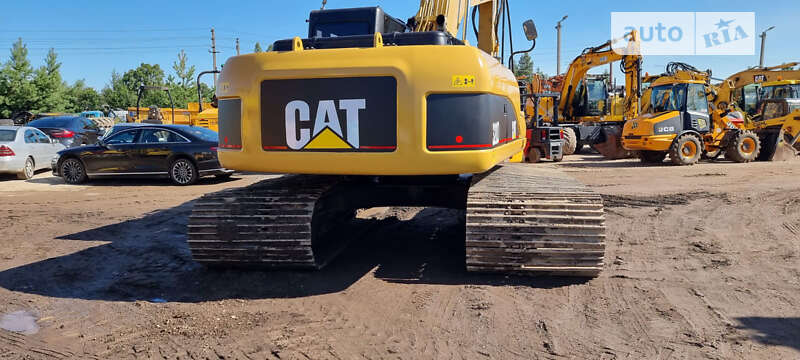 Гусеничний екскаватор Caterpillar 320 2009 в Одесі