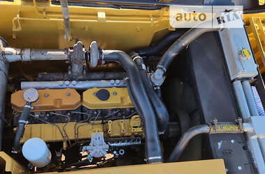 Гусеничный экскаватор Caterpillar 320 2009 в 