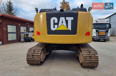 Гусеничный экскаватор Caterpillar 320 2014 в 