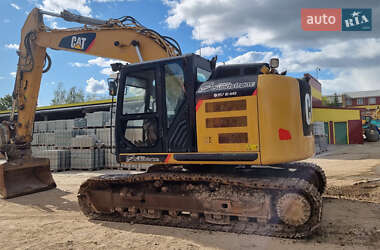 Гусеничный экскаватор Caterpillar 320 2013 в 