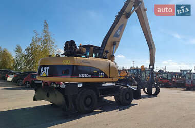 Экскаватор погрузчик Caterpillar 322 2007 в 