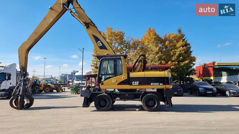 Экскаватор погрузчик Caterpillar 322 2007 в 