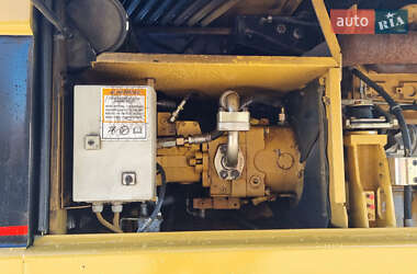 Экскаватор погрузчик Caterpillar 322 2007 в 