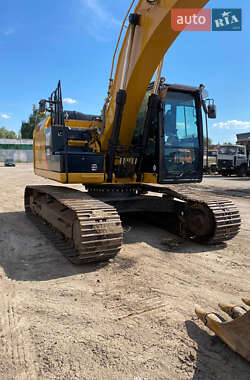 Гусеничный экскаватор Caterpillar 323 2015 в 