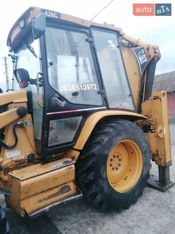 Екскаватор навантажувач Caterpillar 428 1998 в Львові
