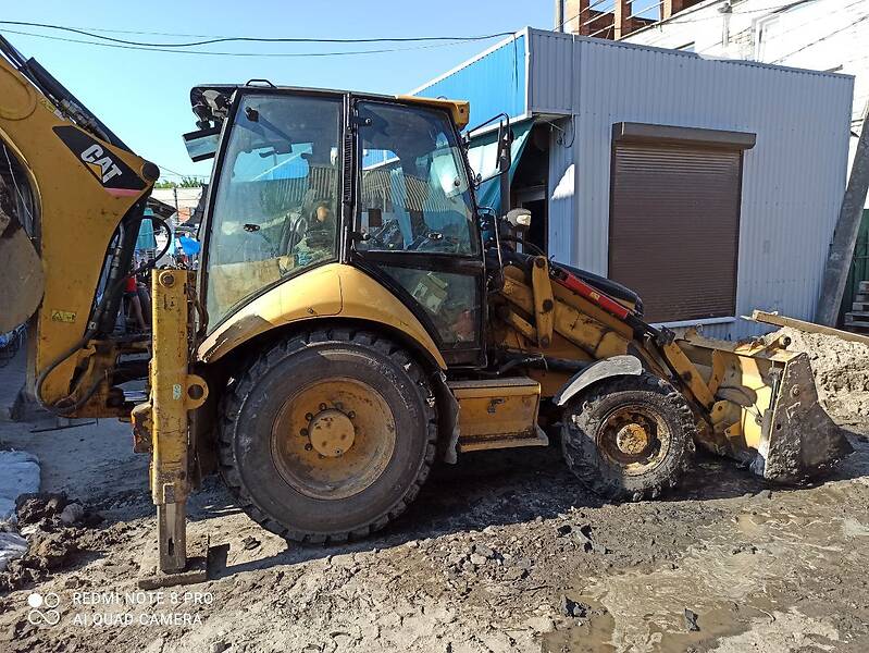 Екскаватор навантажувач Caterpillar 428E 2008 в Ірпені