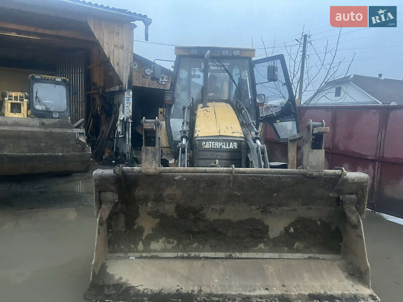 Екскаватор навантажувач Caterpillar 428E 1999 в Малині