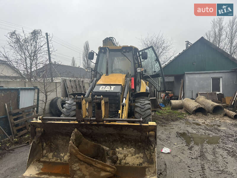 Екскаватор навантажувач Caterpillar 428E 1999 в Малині