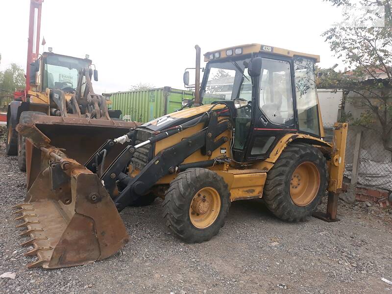 Экскаватор погрузчик Caterpillar 432 2004 в 