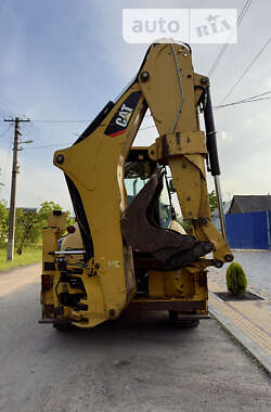 Экскаватор погрузчик Caterpillar 444 2014 в 