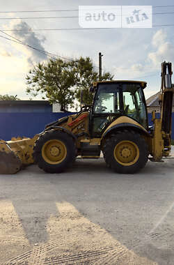 Экскаватор погрузчик Caterpillar 444 2014 в 