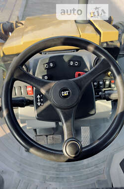 Экскаватор погрузчик Caterpillar 444 2014 в 