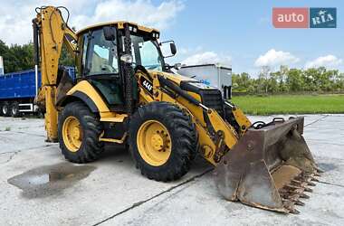 Экскаватор погрузчик Caterpillar 444 2014 в 